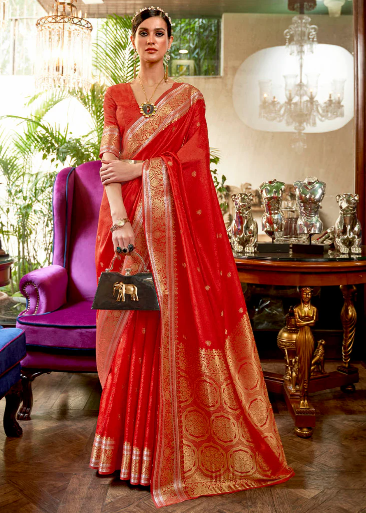 The Enchanting World of Red Sarees: Designs to Dazzle for Every Occasion