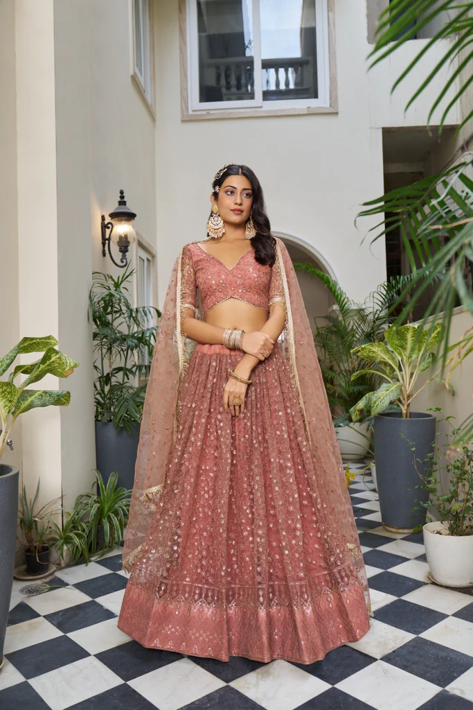 Rust Butterfly Net Lehenga: A Perfect Blend of Elegance and Glamour for Every Occasion